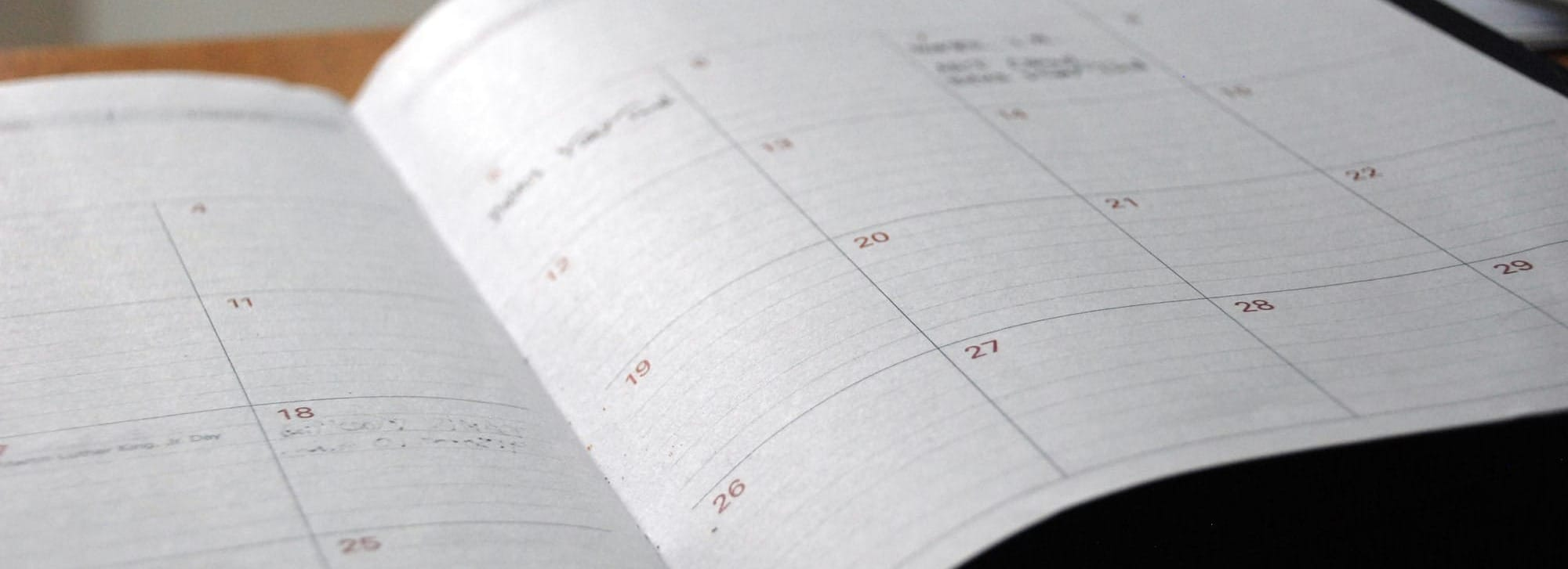 Close up of an open paper calendar